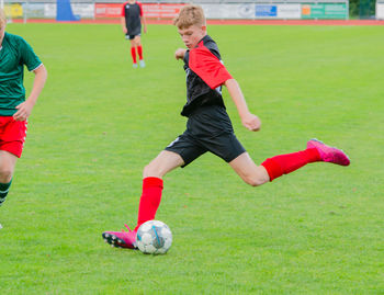 Young soccer player in action during a soccer game