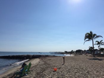 Scenic view of beach against clear sky