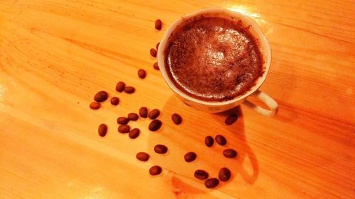 High angle view of coffee cup on table