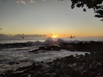 Scenic view of sea against sky during sunset