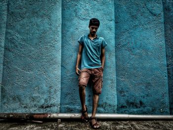 Full length portrait of young man