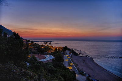 High angle view of sea against sky during sunset