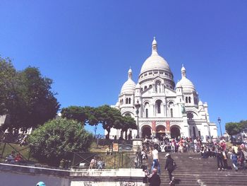 Low angle view of temple against blue sky