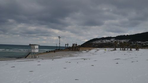 Scenic view of beach against sky