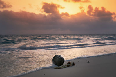 Scenic view of sea against cloudy sky