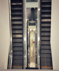 Low angle view of escalator in building