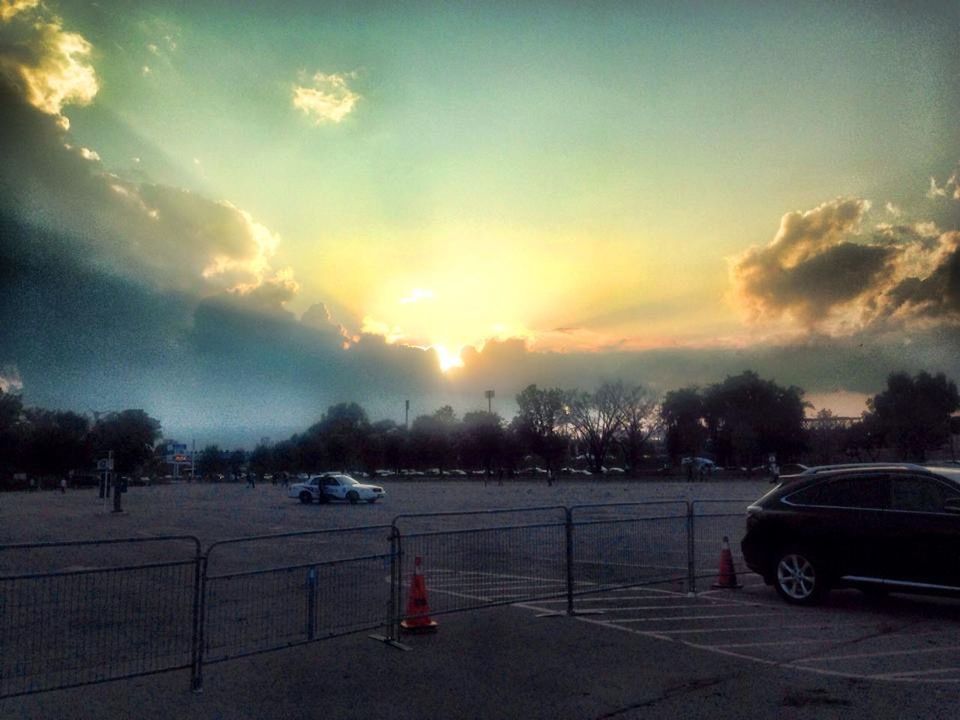 transportation, mode of transport, land vehicle, sunset, sky, car, cloud - sky, stationary, road, parking, parking lot, parked, street, tree, orange color, nature, weather, cloud, cloudy, travel