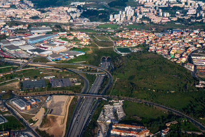 High angle view of road amidst buildings in city