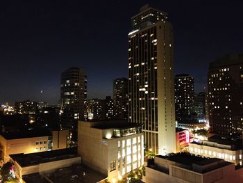 Illuminated cityscape at night