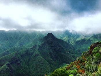 Scenic view of macizo de anaga against cloudy sky