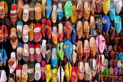 Full frame shot of colorful shoes for sale at market