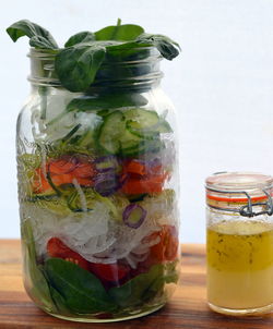 Close-up of drink in glass jar on table