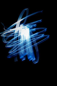 Light painting against black background