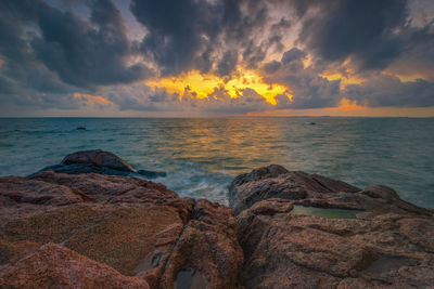 Scenic view of sea against sky during sunset