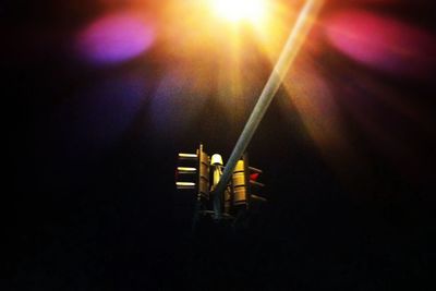 Low angle view of illuminated lights