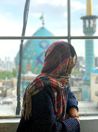 Rear view of woman wearing hat