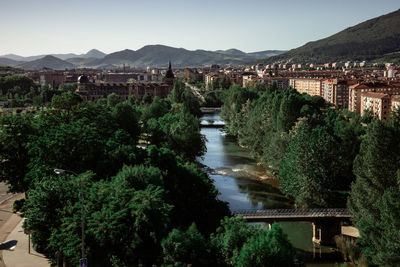 Scenic view of river passing through city