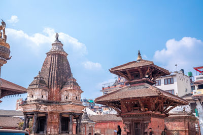 Low angle view of temple building against sky