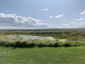 Scenic view of land against sky