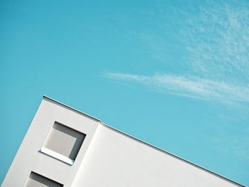 High angle view of building against blue sky