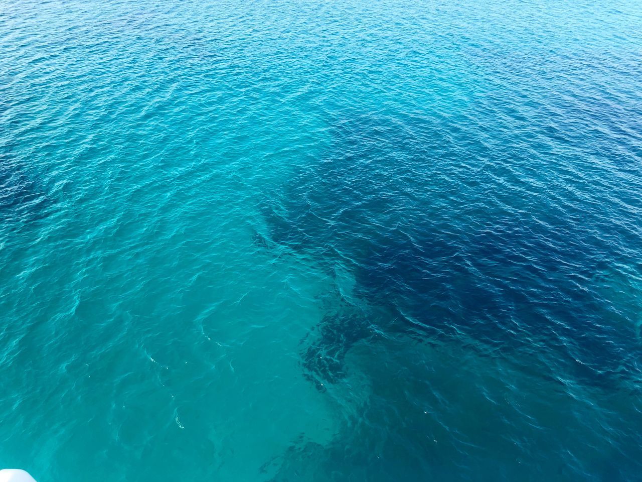 water, sea, beauty in nature, blue, waterfront, full frame, no people, backgrounds, day, high angle view, tranquility, scenics - nature, nature, rippled, outdoors, tranquil scene, idyllic, turquoise colored, natural pattern, marine