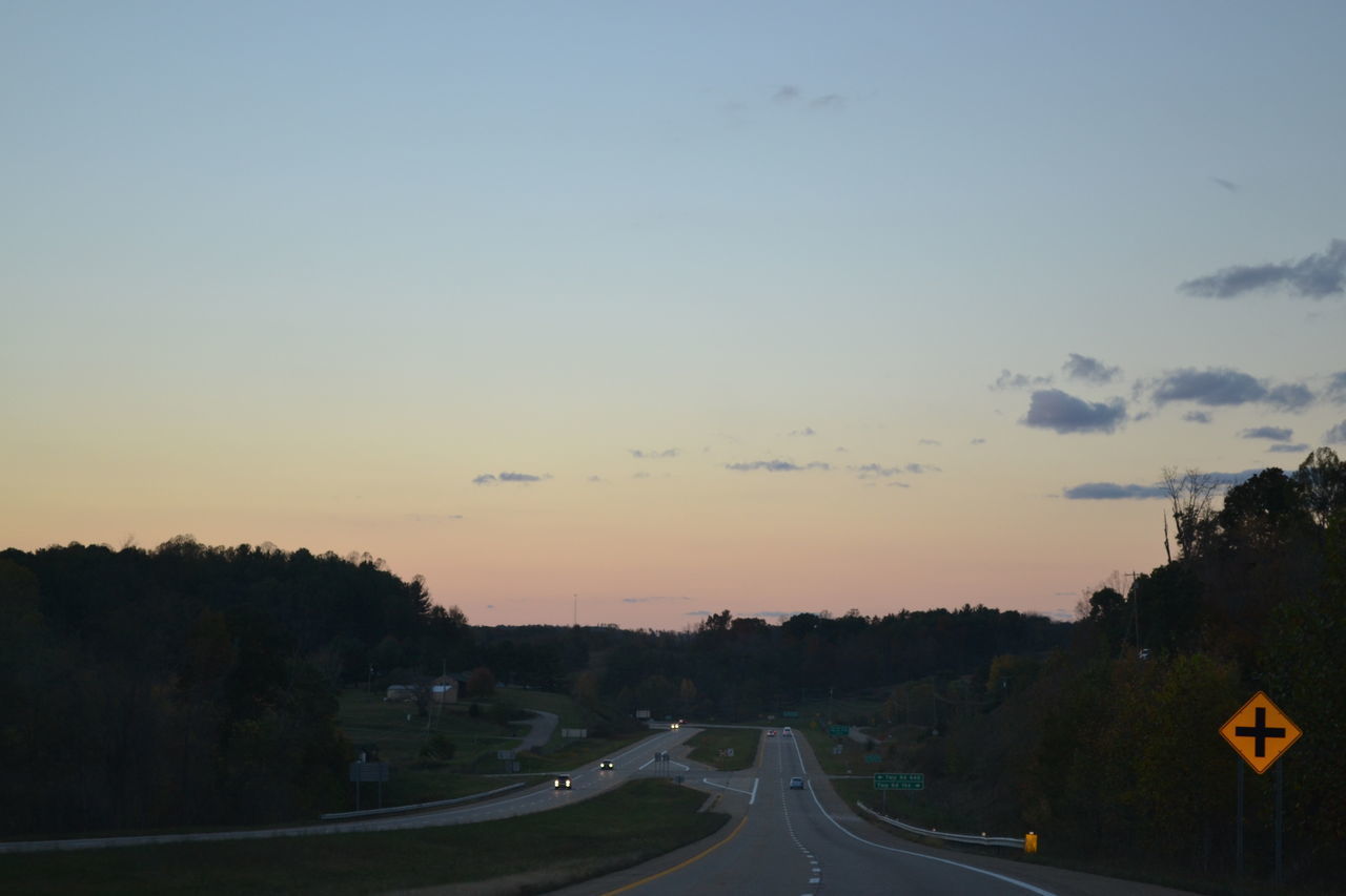 ROAD AGAINST SKY DURING SUNSET