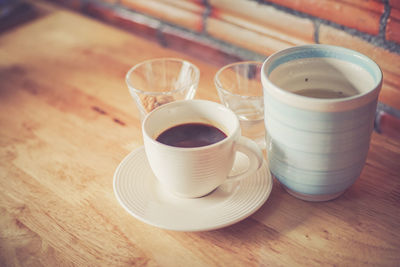 Close-up of coffee cup on table