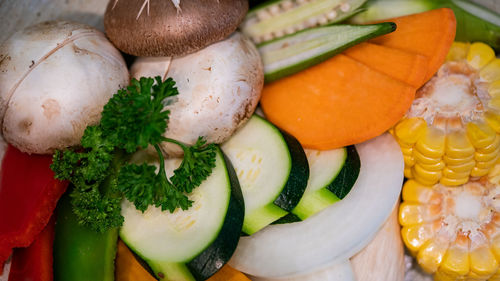 High angle view of fruits in plate on table