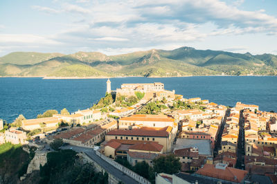 Houses with mountain range in background