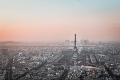 High angle view of city buildings during sunset