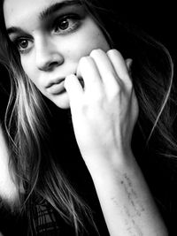 Close-up of thoughtful woman looking away