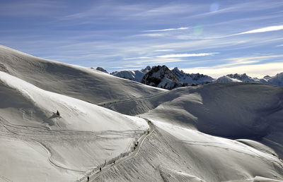 Scenic view of mountains against sky during winter