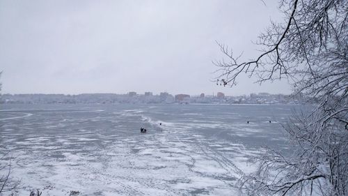 Scenic view of frozen lake against sky