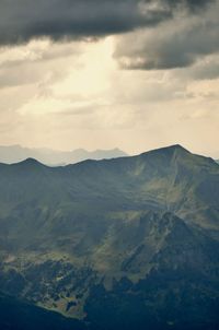Scenic view of mountains against sky during sunset
