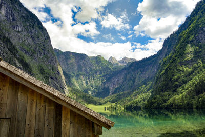 Calm lake against rocky mountains