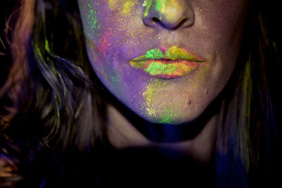 Close-up portrait of a woman in a cropped hand