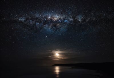 Low angle view of star field against sky at night