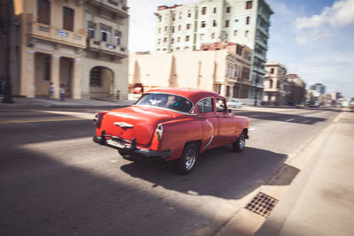 Cars on road in city