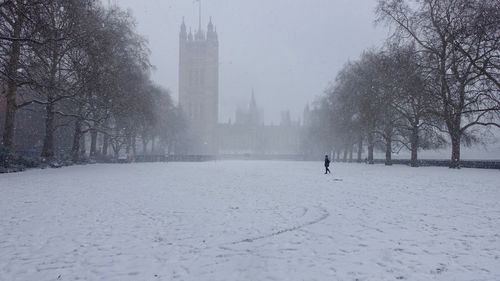 View of snow covered buildings in city