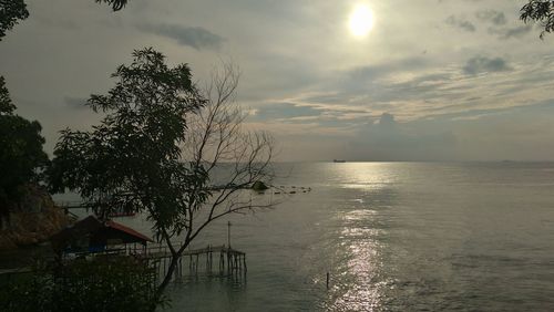 Scenic view of sea against sky at sunset