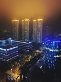 Illuminated cityscape at night