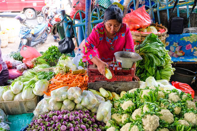 Various vegetables for sale at market stall