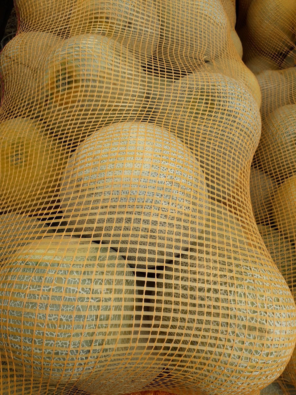 FULL FRAME SHOT OF FISHING NET ON FLOOR