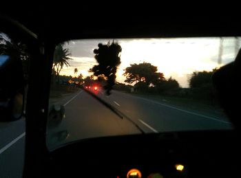 Road seen through car windshield