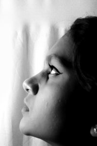 Close-up portrait of woman looking away