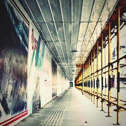 Empty corridor along buildings