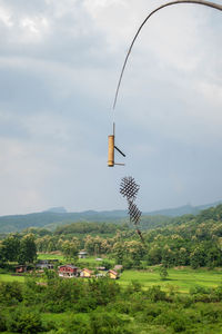 Built structure on landscape against sky