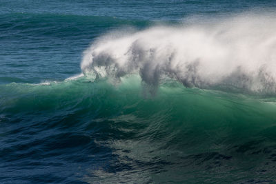 Waves splashing on shore