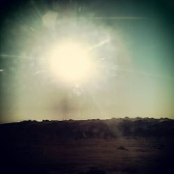 Scenic view of landscape against sky during sunset