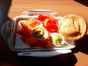 High angle view of breakfast served on table